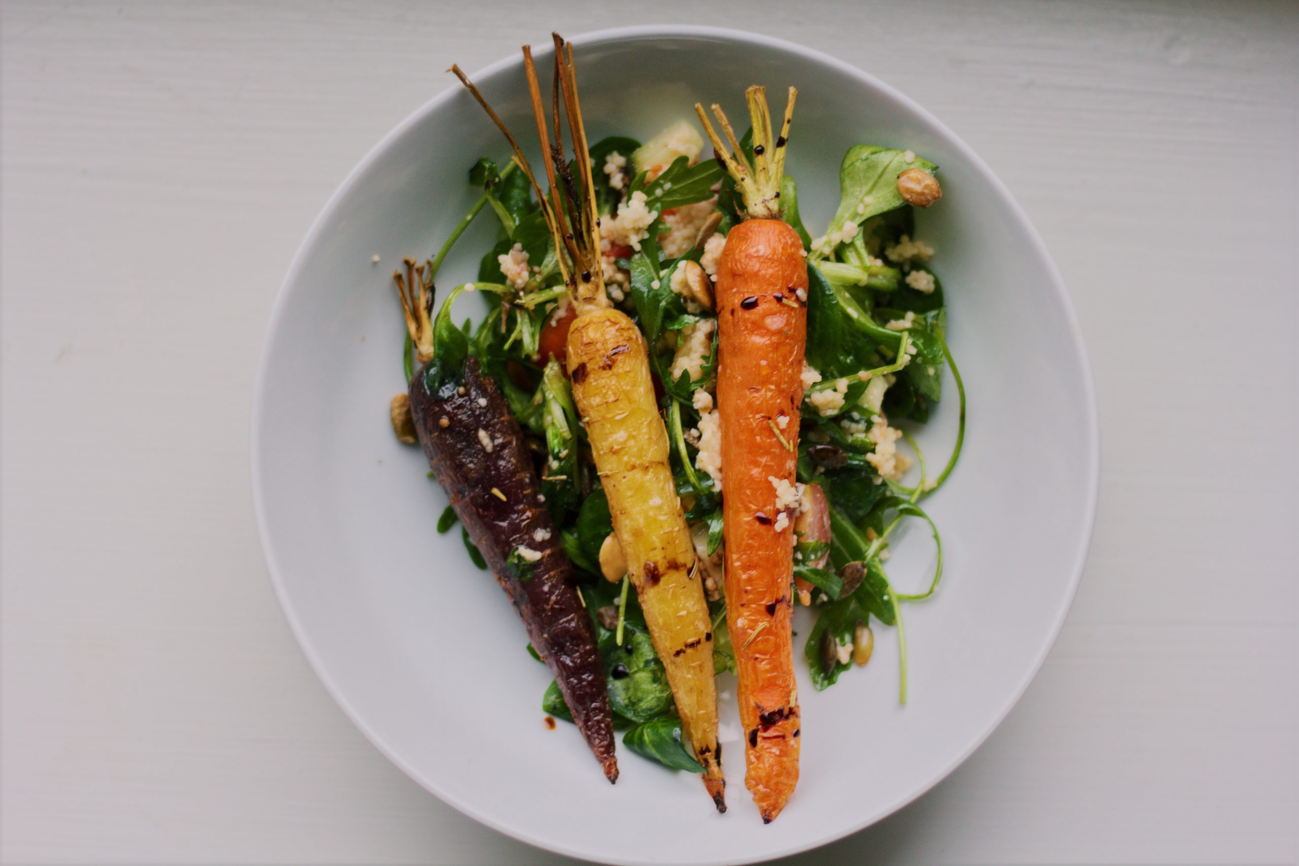 Couscous met gekarameliseerde wortel en geroosterde pompoenpitten